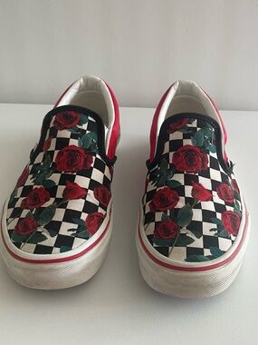 Vans Kids Slip-On Sneakers in Black, White, Red and Green Rose Print